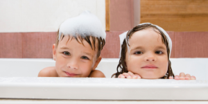 the difference between hard water and soft water: kids in the shower